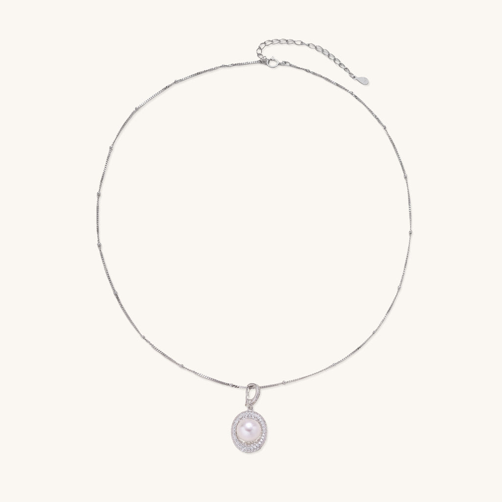 Sterling silver necklace with freshwater pearl in sparkling crystal halo pendant on delicate beaded chain