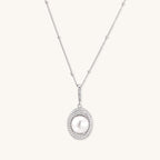 Sterling silver necklace with freshwater pearl in sparkling crystal halo pendant on delicate beaded chain